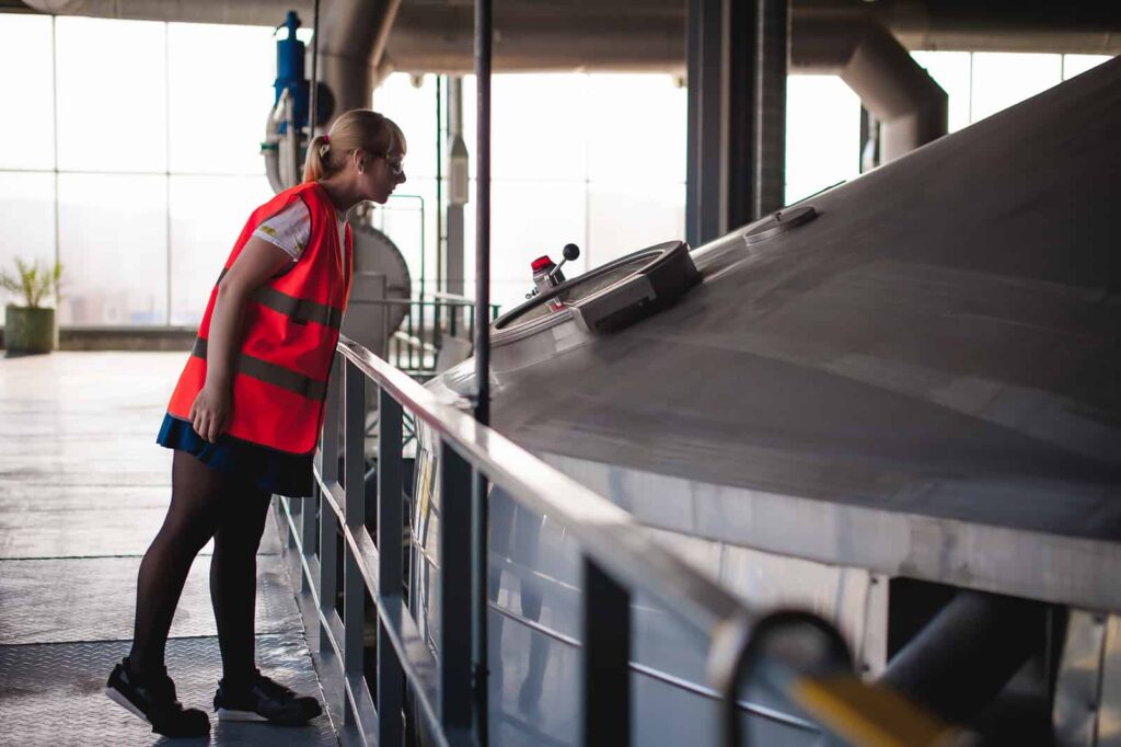 A food production plant manager considers a CIP system for her brewery.