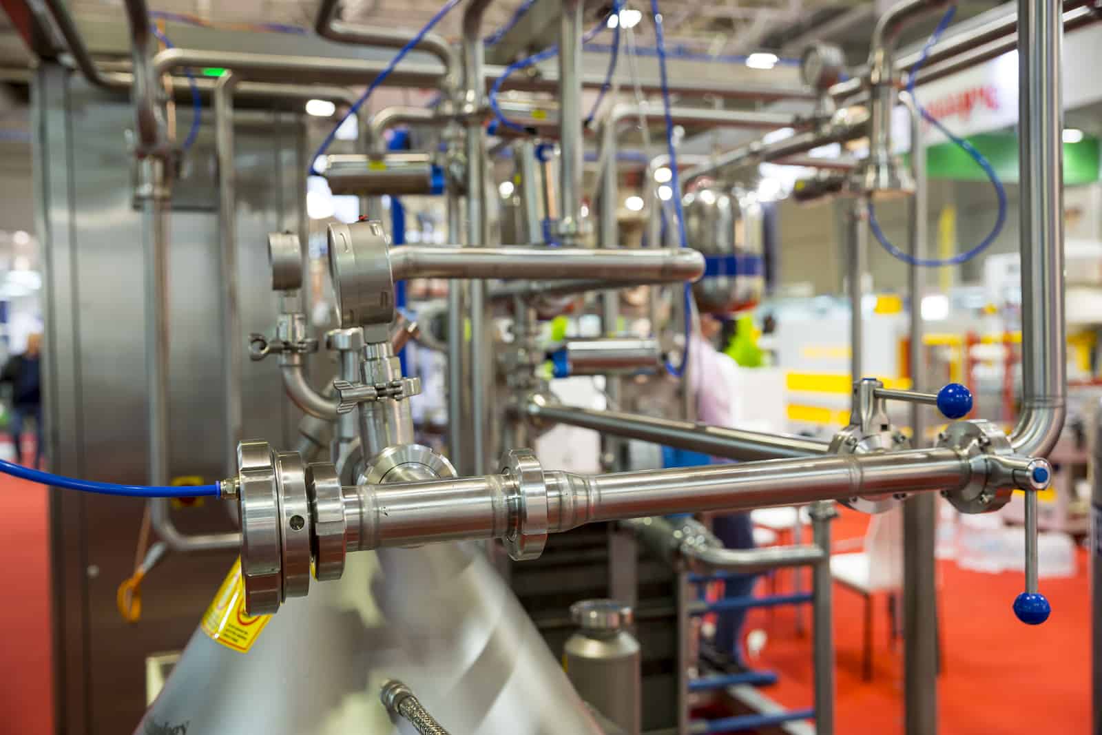 A newly upgraded milk pasteurization system in a dairy processing plant.