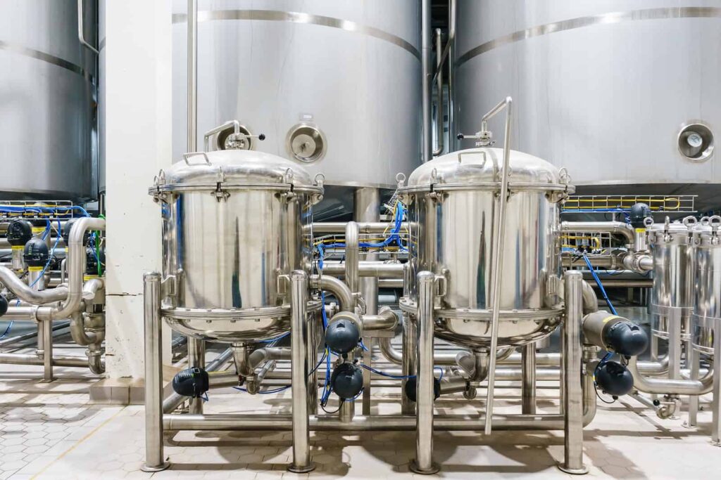 Stainless steel tanks inside a pharmaceutical factory