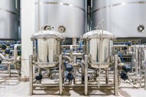Stainless steel tanks inside a pharmaceutical factory