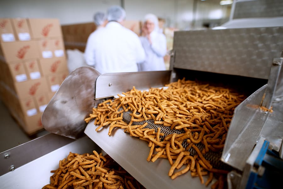 A food manufacturing line produces snacks. 