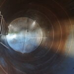 10,000 GALLON STAINLESS STEEL VERTICAL SINGLE SHELL STORAGE TANK