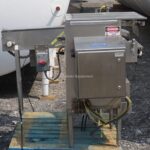 SHRINK WRAP INFEED CONVEYOR COALATOR